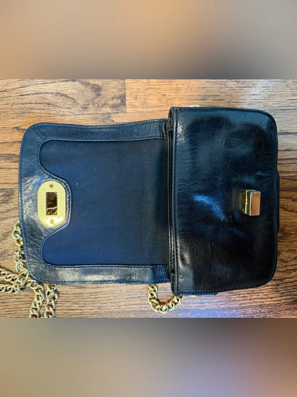 Black Leather Crossbody Bag with Gold Chain